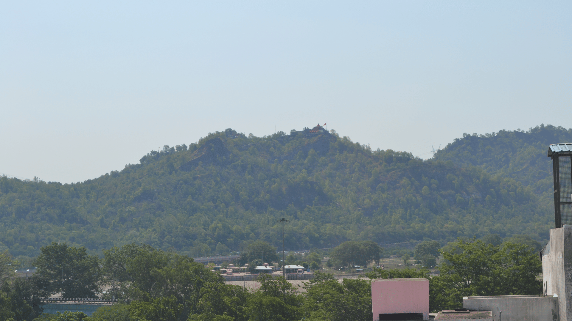 The Shivalik hills and the hilltop temple above Haridwar, seen from Signum Tathastu Boutique Hotel