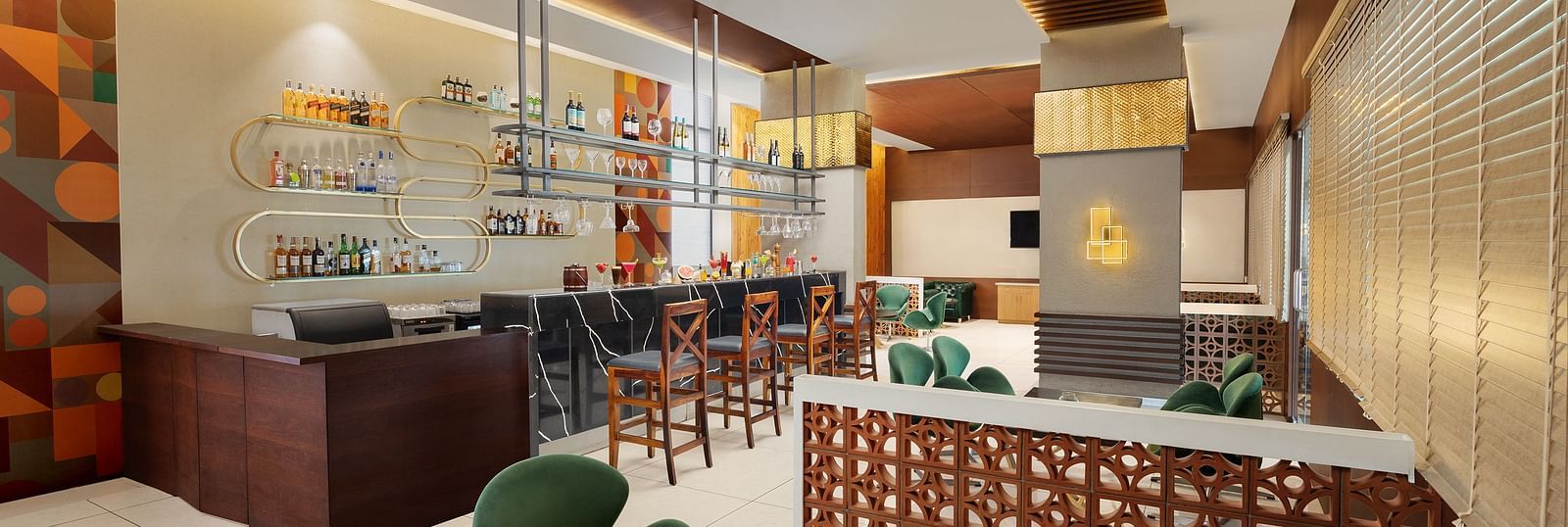 Citron Bar at Essentia Luxury Hotel, Indore with a white and brown ambience.