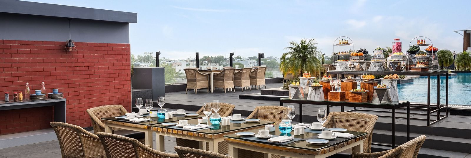 Rooftop seating arrangement at Essentia Luxury Hotel, Indore