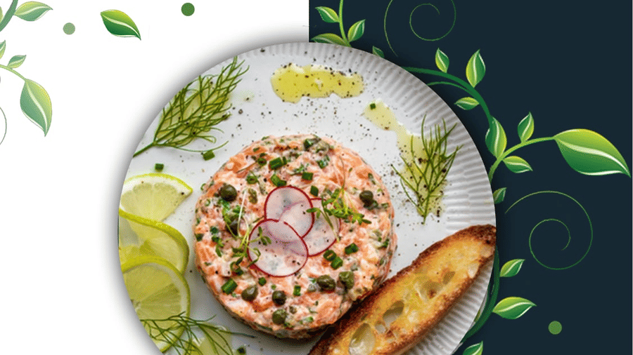 Promotional poster for The Bristol Hotel, Gurgaon advertising a food and beverage discount, showing a plated salmon tartare with toasted bread and lemon slices.