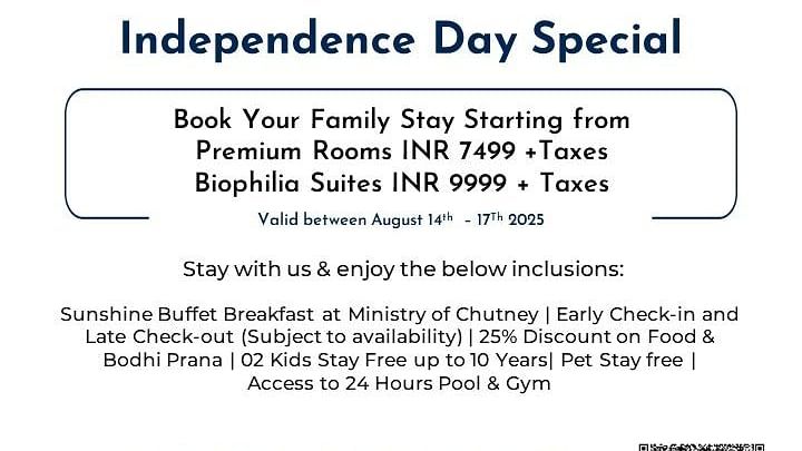 Creative dining scene photography of a young couple sharing drinks and appetizers in a vibrant hotel restaurant with colorful artwork and ambient lighting, enjoying the dining experience during their Independence Day special stay.