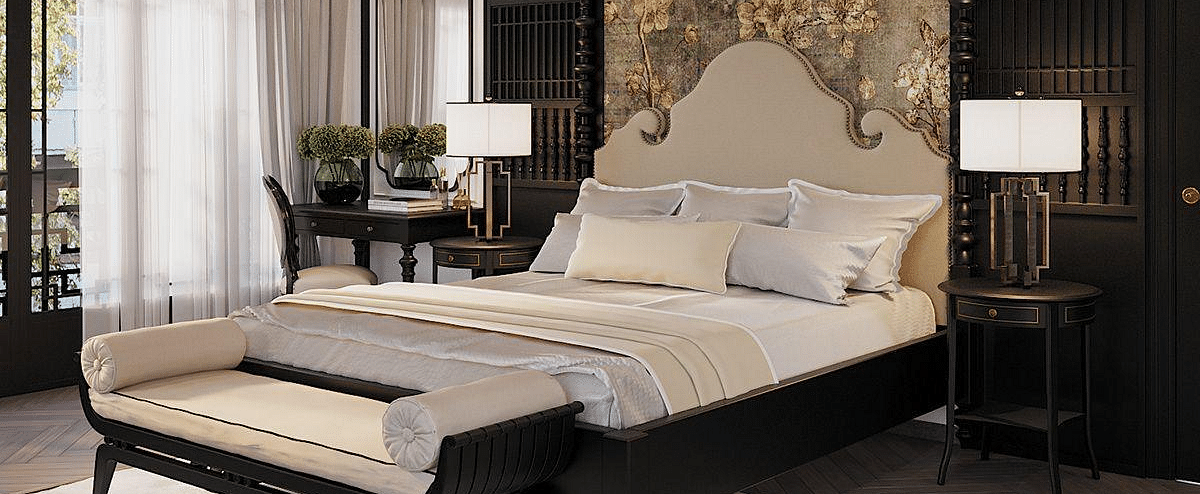 A spacious room with a diagonal view of the large bed, and a large window to the side at The Evren, Vagator.