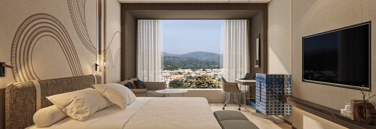 A side wide view of a double bed room with TV, rug, work desk and chair with a window overlooking an outside view