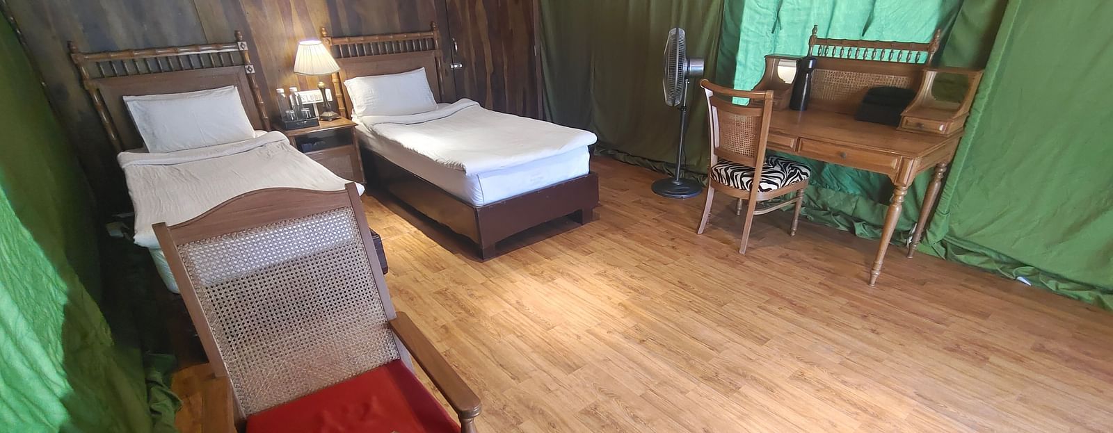 a room with two single beds and a work desk - The Jamoon, Corbett