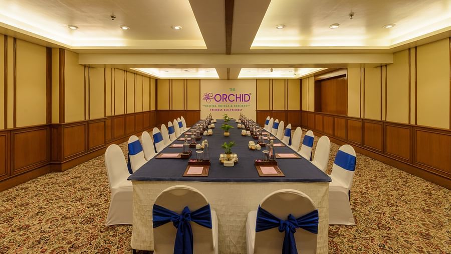 Boardroom setup with blue and white decor at The Orchid Hotel Mumbai Vile Parle