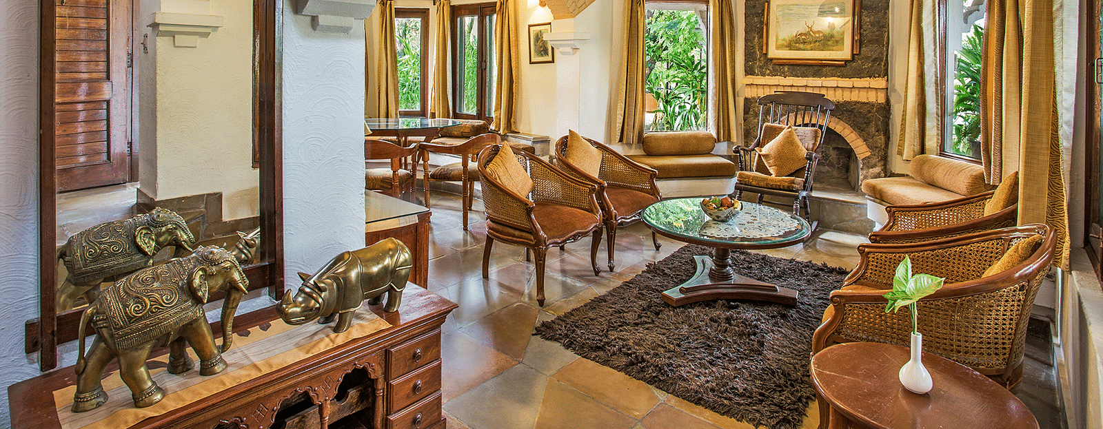 Hotel living room featuring a chair and a round table.