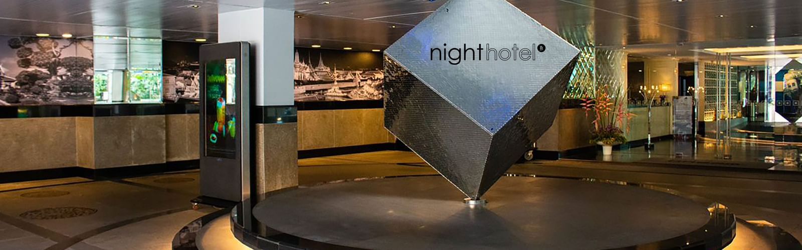 a silver Cube in the lobby of Night Hotel Bangkok