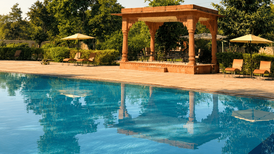Sandstone Pavilion Reflections by the Pool at Umaid Palace Dausa-Resort near jaipur