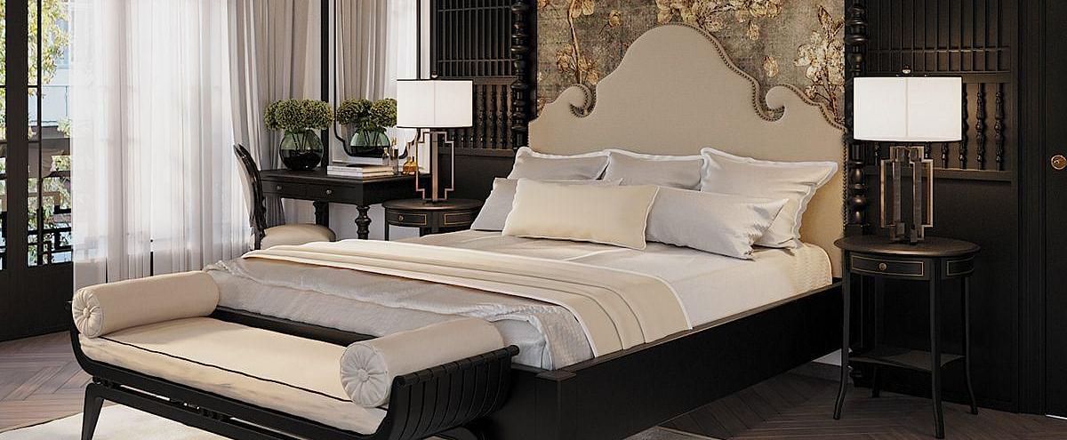 A spacious room with a diagonal view of the large bed, and a large window to the side at The Evren, Vagator.