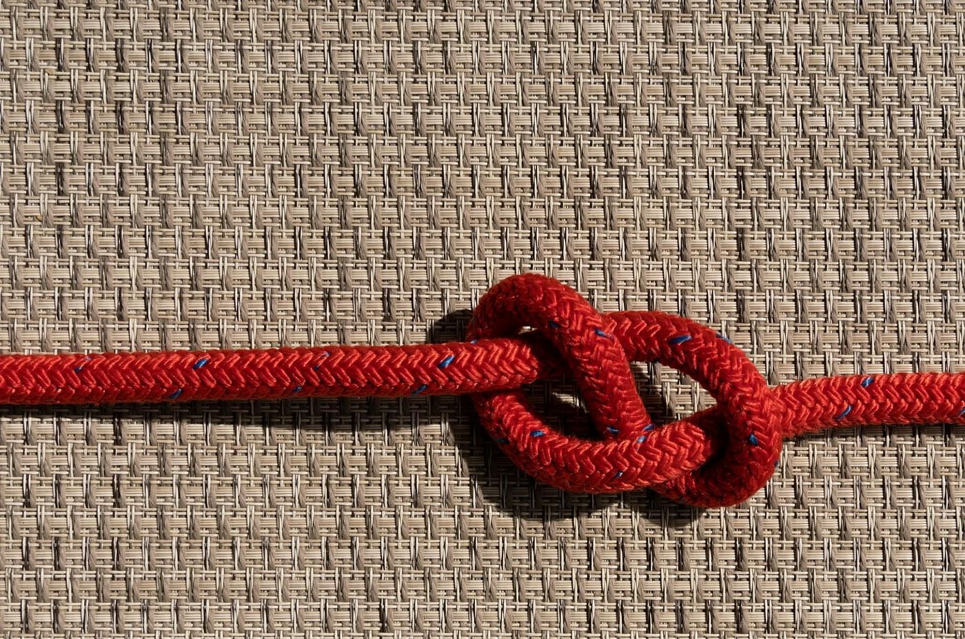 Top view of a rope tied in a knot.