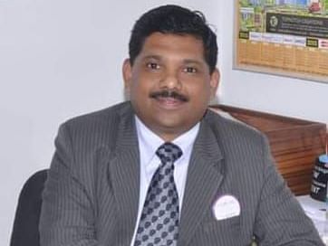 A close-up image of Mr. Mohammed Aslam Syed (Area Director) - Kamats India