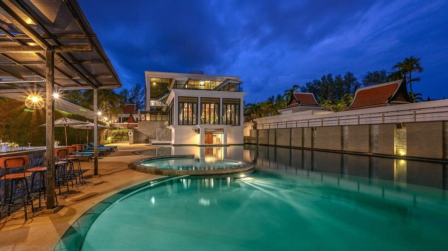 facade image of the resort featuring the beautiful swimming pool - Maikhao Dream Villa Resort & Spa, Phuket