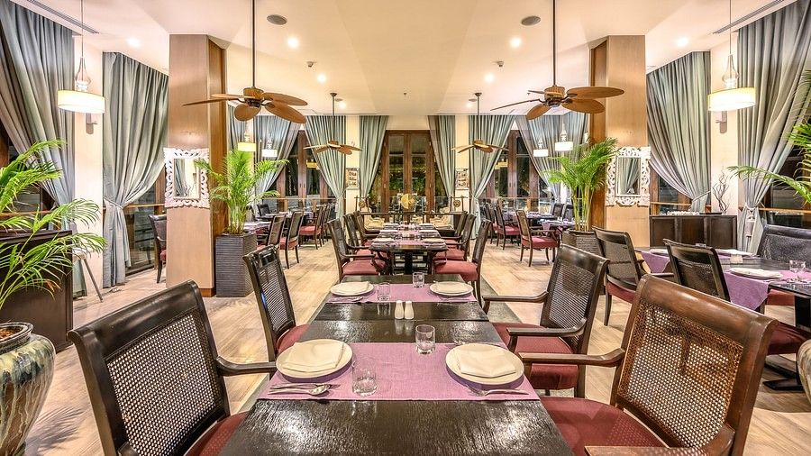 image of the dining table with cutlery placed on it - Maikhao Dream Villa Resort & Spa, Phuket 