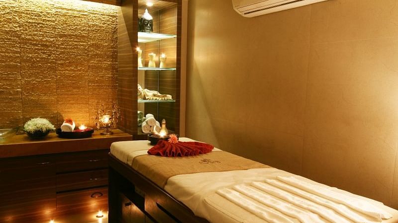 Image of a spa room with a spa bed at IOSIS spa & wellness Guwahati