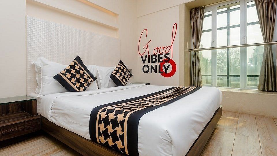 Premium room at Mumbai House Hotel, Juhu with a double bed