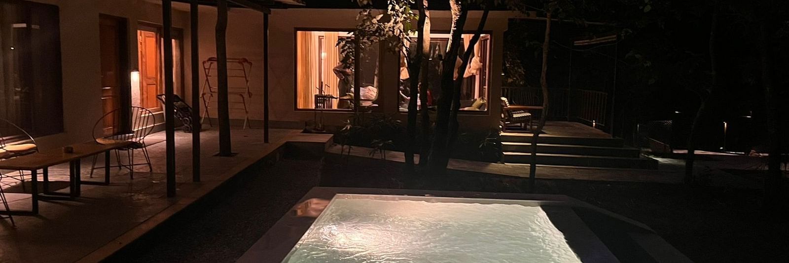 Sanctuary Suite at Saraca Resort & Spa Corbett with an outdoor plunge pool at night