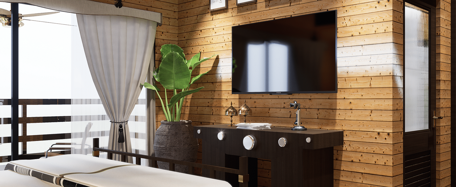 A bedroom with a bed, television, framed pictures, and a plant against a wood panelled wall - Rhino and River BluSalzz Collection, Pobitora