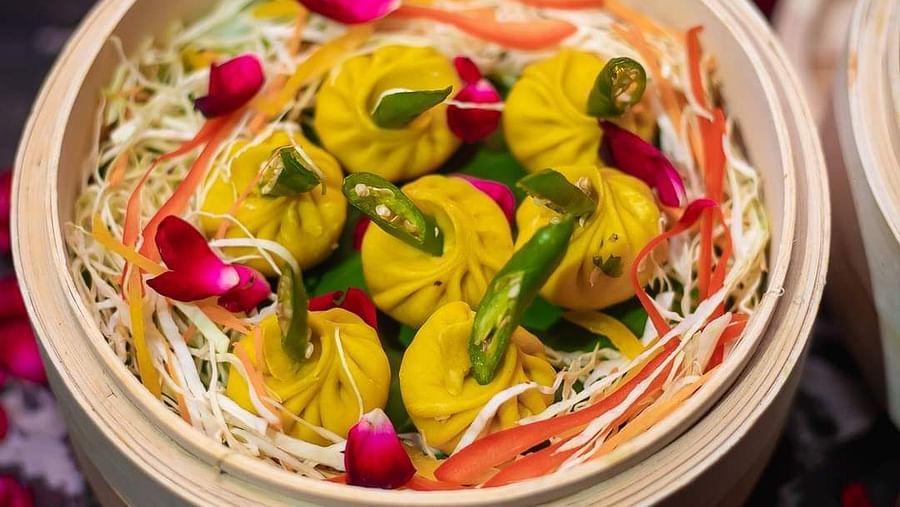 An image of a basket which has dumplings - Themis Barbecue House, NSP Pitampura