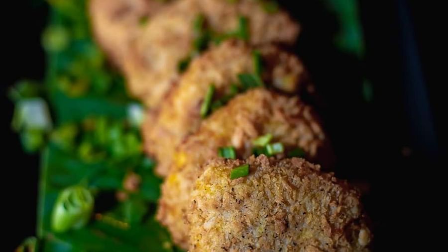 An image of a fritters served on a platter at Themis Barbecue House, NSP Pitampura