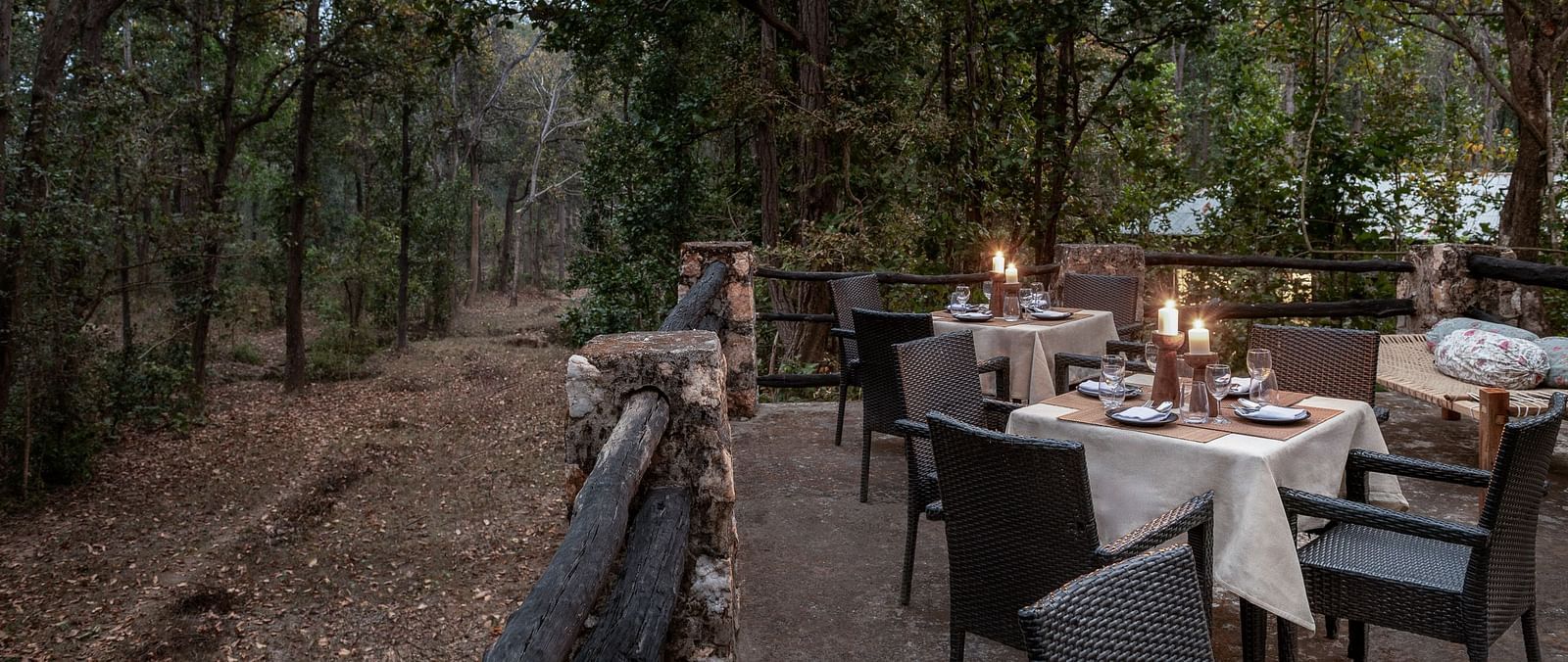 Dining setup at Machaan dining at Saccharum Safari Lodge, Balaghat
