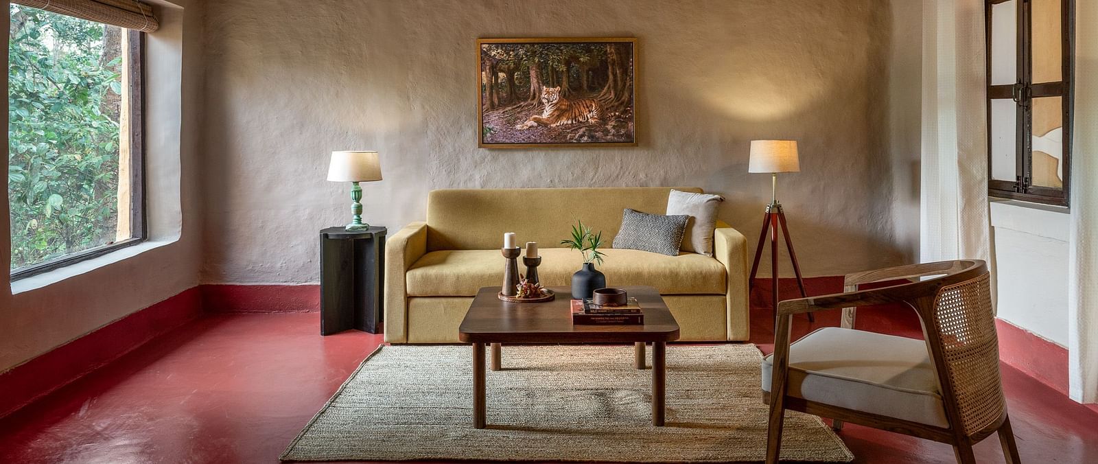 Front view of the sofa in Mud House Suite at Saccharum Safari Lodge, Balaghat