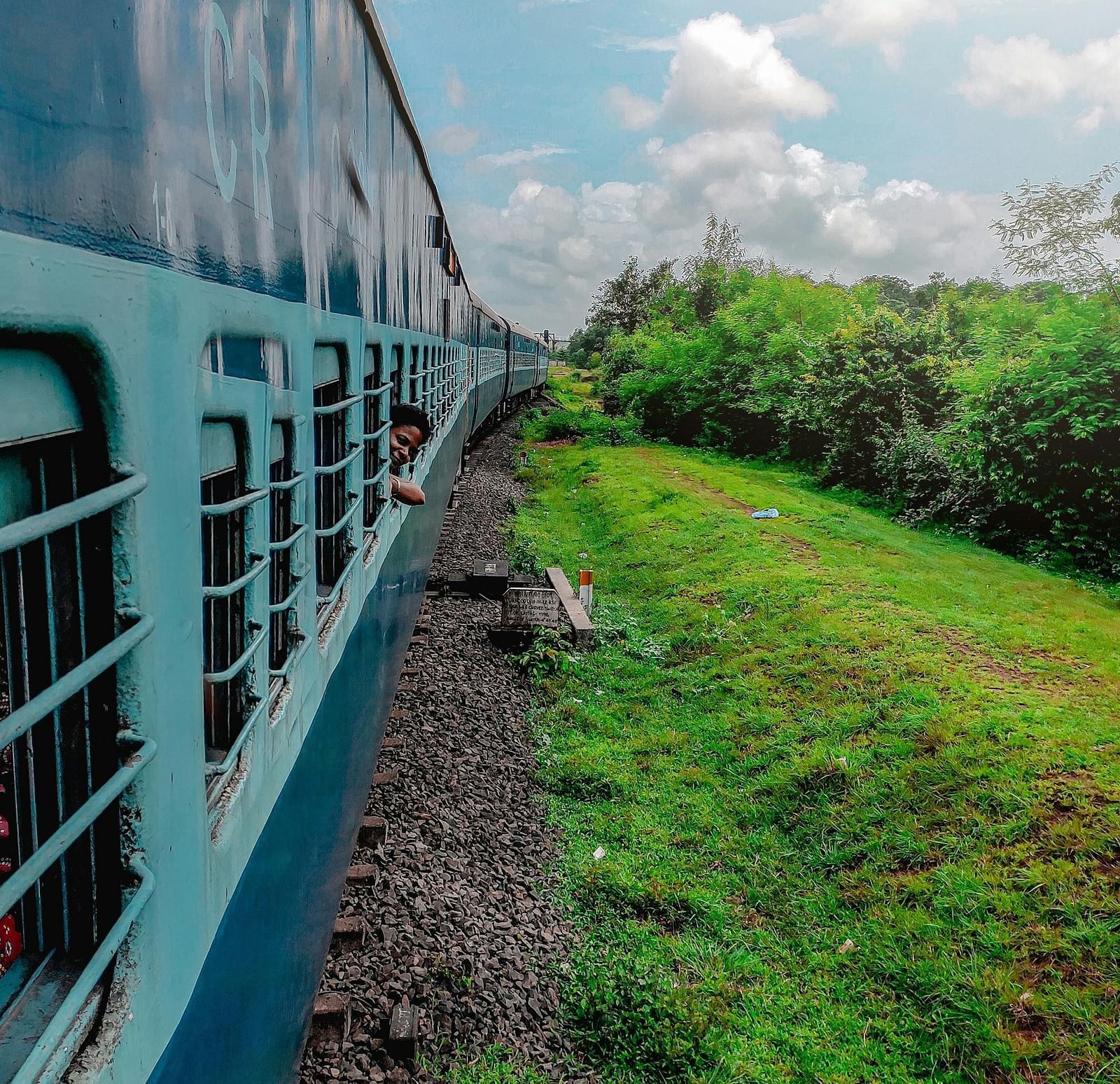 An image of a train running on a railway track | Ocean Spray