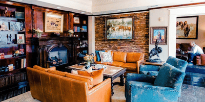 Cosy lounge area with plush seating and warm lighting for relaxed gatherings and conversations