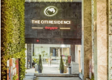 Entrance with a name board above.