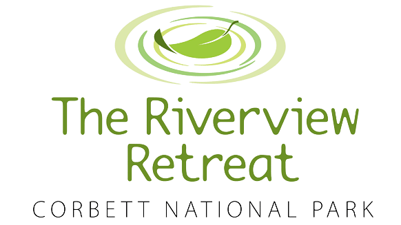 An image of a poster which has The Riverview Retreat Corbett National Park written on it
