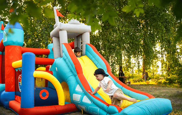 A small girl sliding.