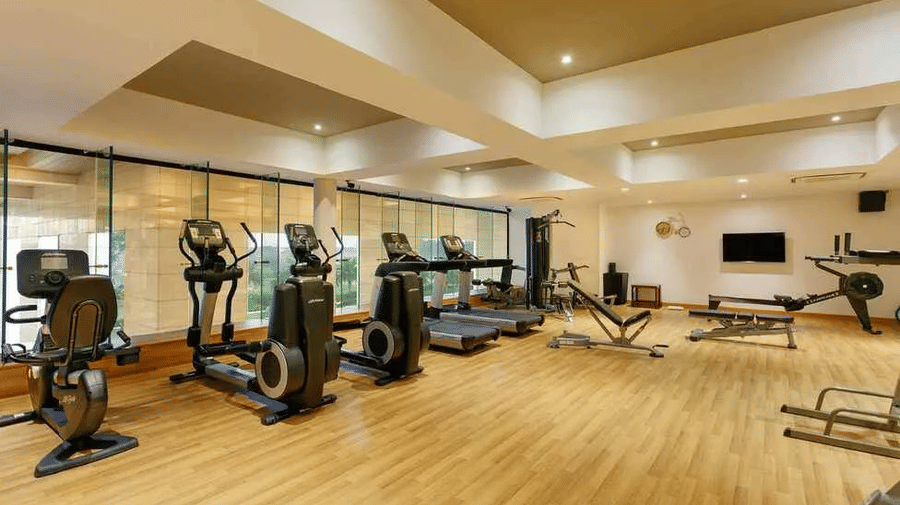 Gym with treadmills at Karma Chalets.
