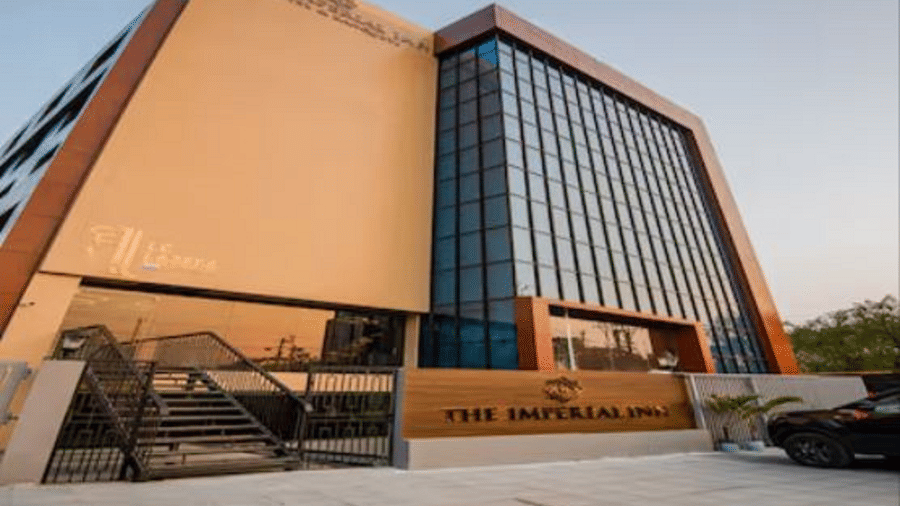 The facade of Yashshree The Imperial Inn, Siliguri with clear sky
