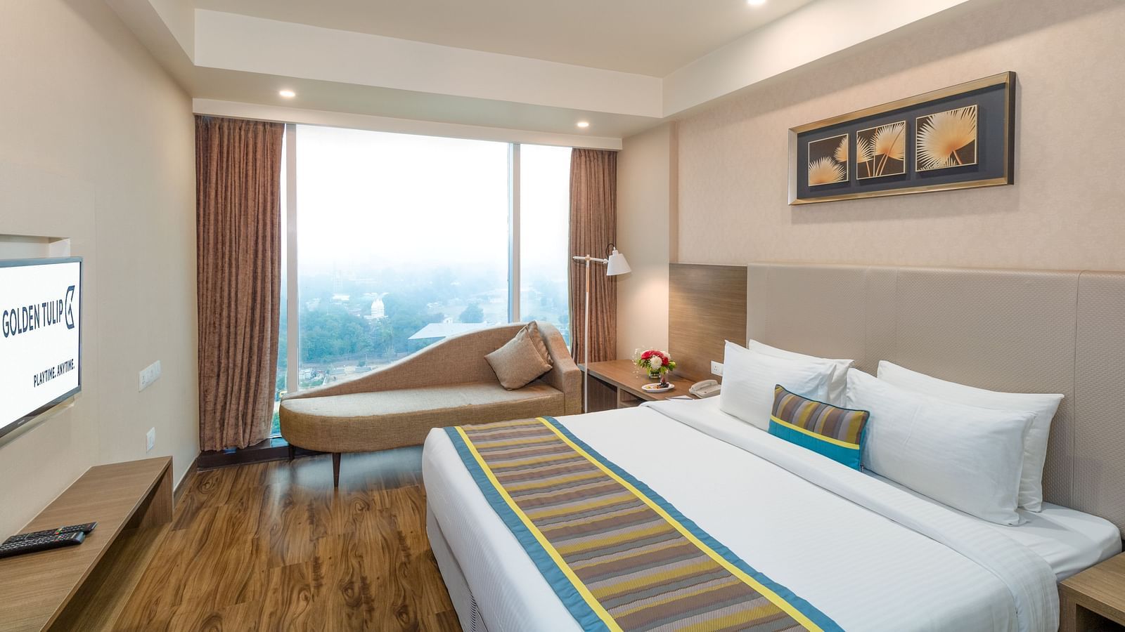 Double bed in the Suite at Golden Suites, Gurgaon