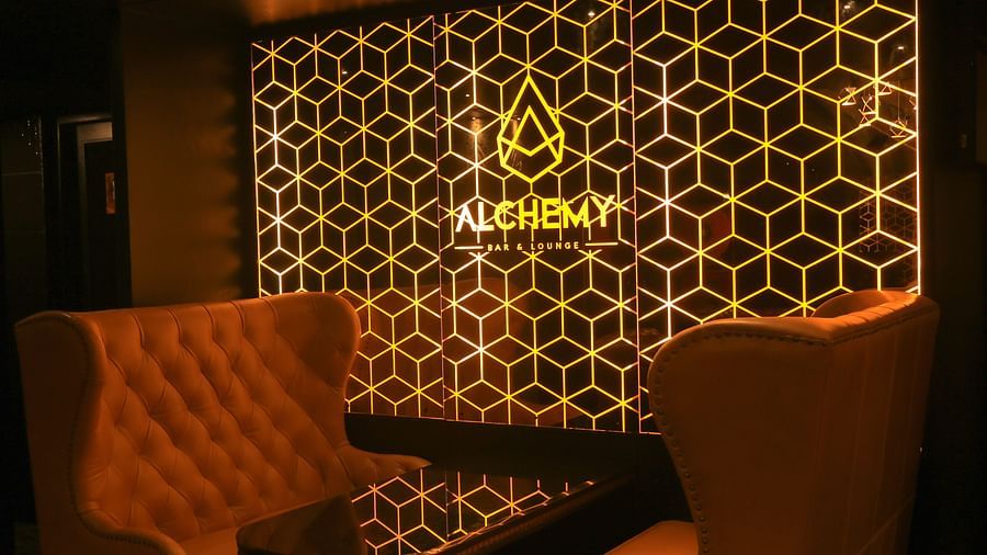 single seater sofas inside Lounge at Alchemy, our in-house bar in Chennai - Raj Park Hotel, Chennai
