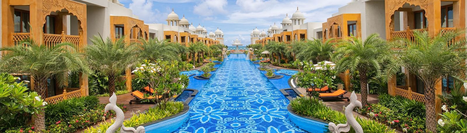 The palace pool at Kaldan Samudra Palace, surrounded by sun loungers and Rajasthani-inspired architecture on either side – Kaldan Samudra Palace, one of the finest ECR resorts with swimming pool, offering a serene and luxurious retreat