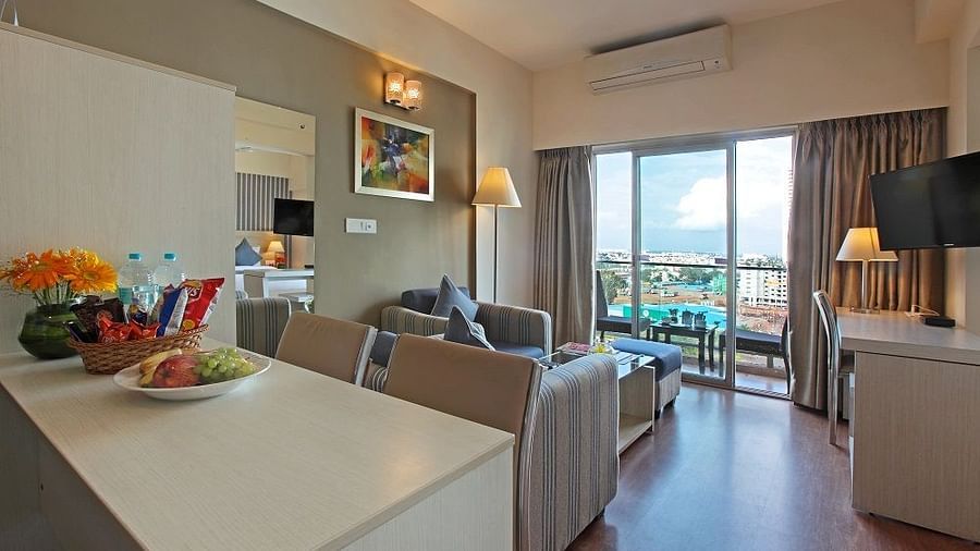 Living room area of the Deluxe Room at Starlit Suites, Bangalore