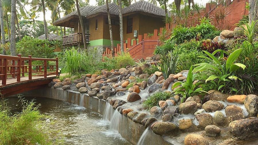 Facade view of the hotel with water fountains