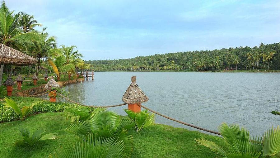 A balcony arrangement with a scenic view of the lake, accessible by a pathway.