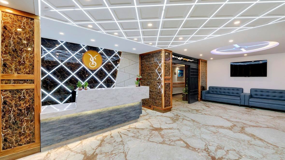 An image of the lobby at Yashshree Sikkim Blossom, Gangtok featuring the seating area with sofa sets and the reception