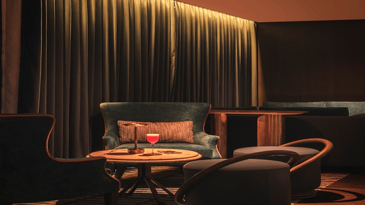 Cosy lounge seating with ambient lighting at The Residency Towers Chennai.