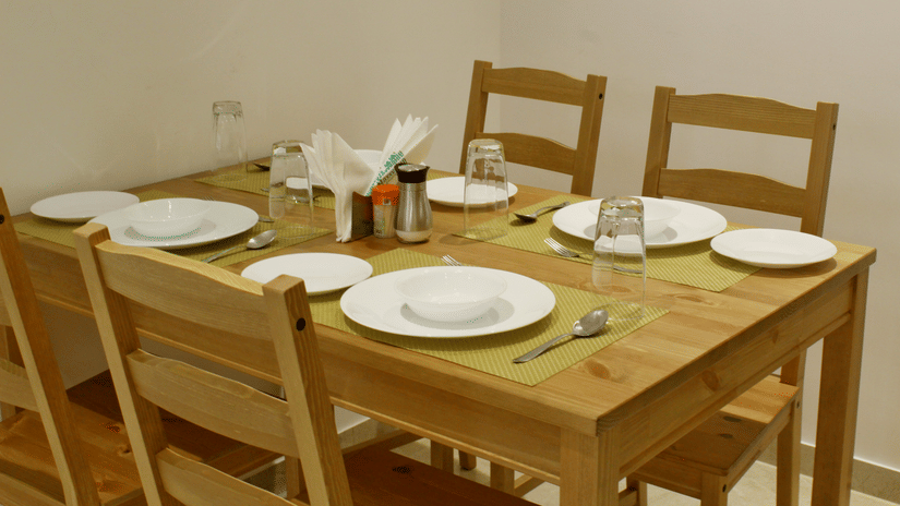 View of Dining Table with multiple chairs and plates - Maxxvalue Apartment Hiranandani, Powai