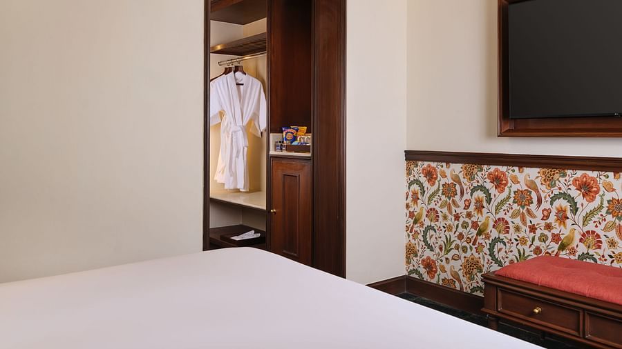 The Premium King Garden View Room at The Ummed Ahmedabad is designed for comfort with a king size bed and a stylish wardrobe