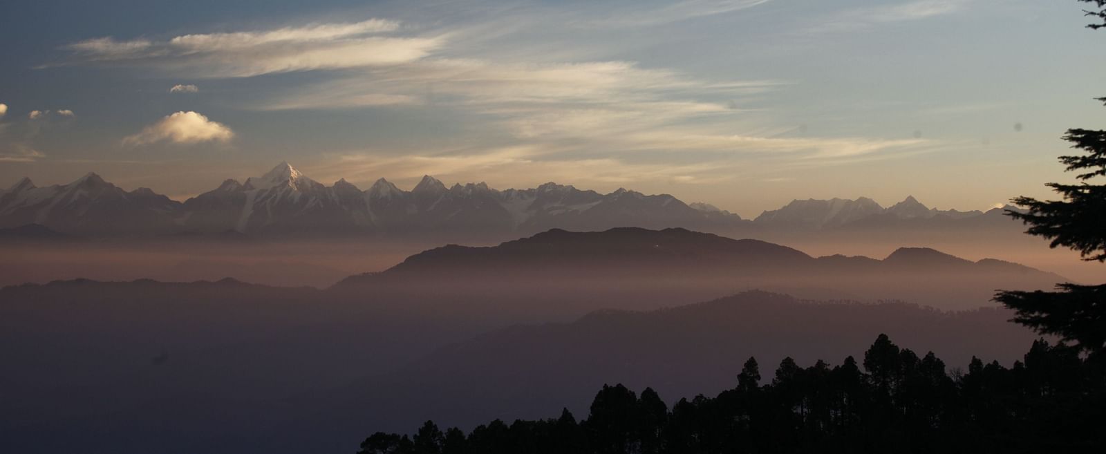 Sunset hues over distant mountain ranges - BluSalzz Escapade - Anant Rasa Resort