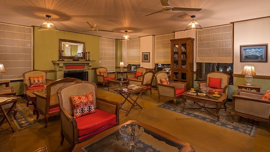 A cosy lounge with beautiful and calming and royal look at Fishermen's Lodge, Bhimtal.