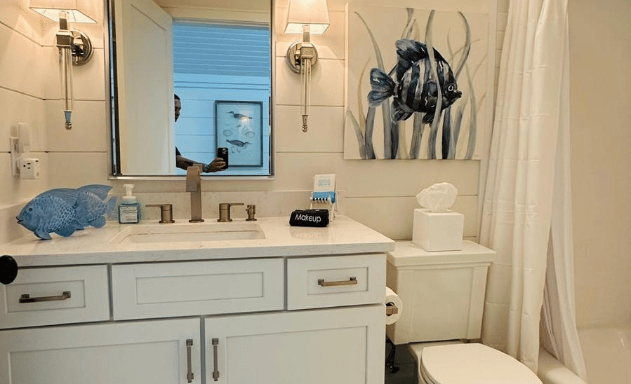 A well-lit washroom of Elbow Room Villa 7 in Abaco inn with modern amenities