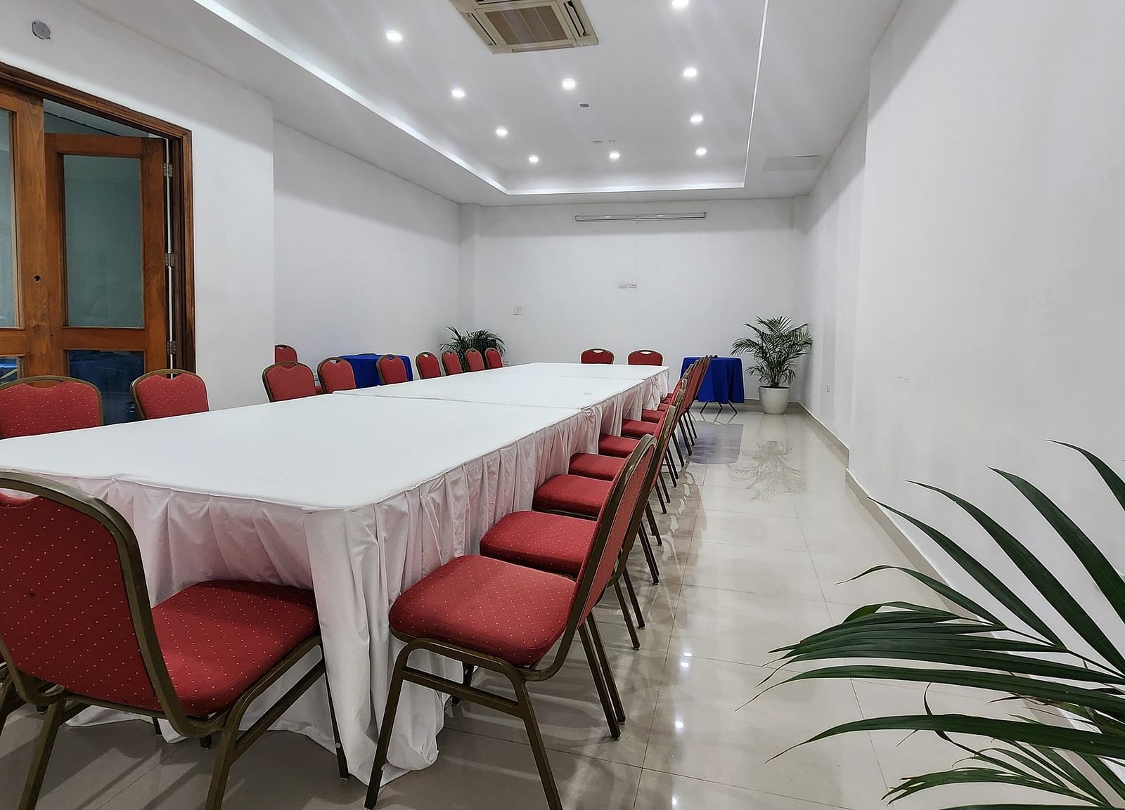 An image of a banquet hall with a table arranged in a long table arrangement - Hotel 39, Jamaica
