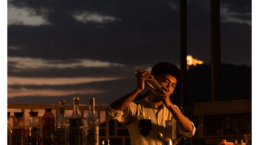 a view of bartender preparing drinks