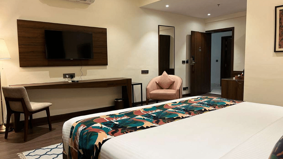 premium city view  room with king sized bed and TV at Aura Boutique Hotel, Udaipur