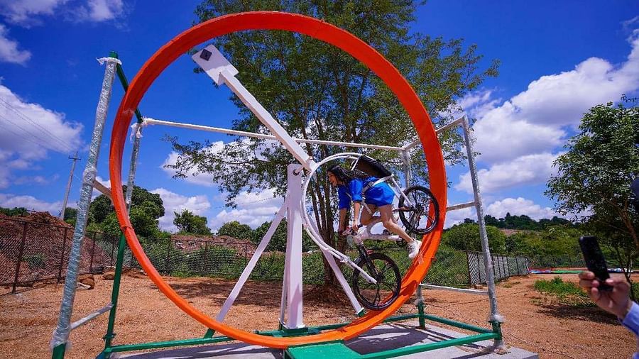 A person riding 360 Degree Cycle on a sunny day under blue sky at Ravishing Retreat