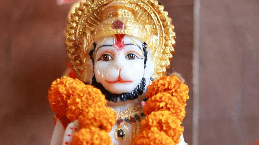 Image of a statue of lord Hanuman adorned with a flower garland - The Dukes Retreat, Khandala